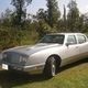 Illustration for article titled Could This 1990 Avanti LTS Four-Door Be Worth $28,000? Its Got Three DVD Players!